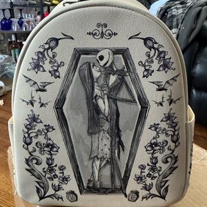 Loungefly Beige Mini Backpack with Black and Purple Gothic Artwork